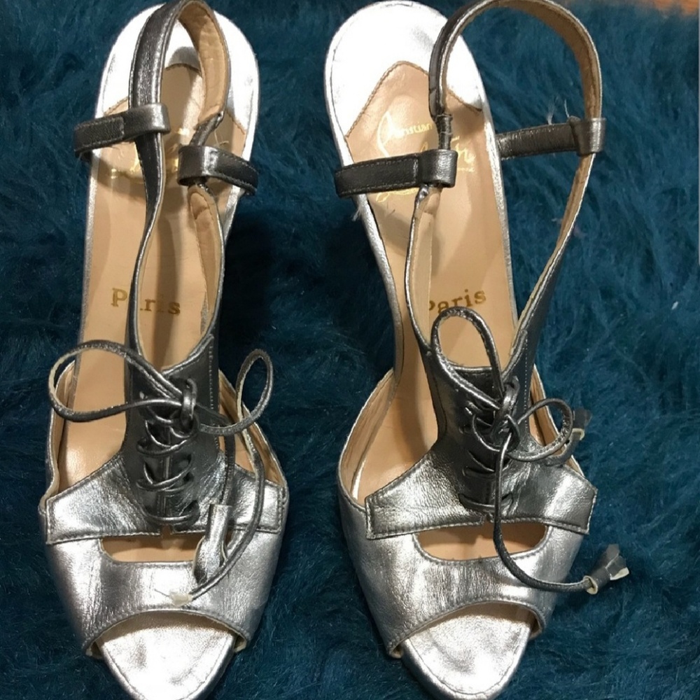 Christian Louboutin red bottom heels silver bootie
